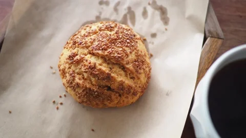 Enjoying coffee and a cookie on a simple table Stock Footage 336295710