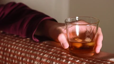 Enjoying a drink on the rocks in candle light Stock Footage 167424374