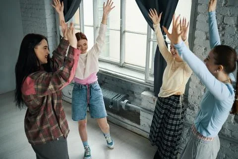 Enjoying Group Dance Class in Bright Studio Stock Photos