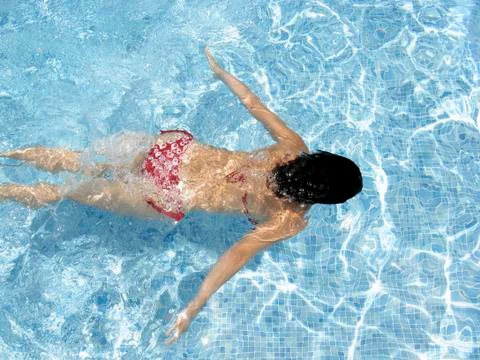 Enjoying the hotel pool Stock Photos