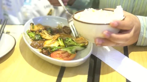 Enjoying a meal in a restaurant Stock Footage 300427005