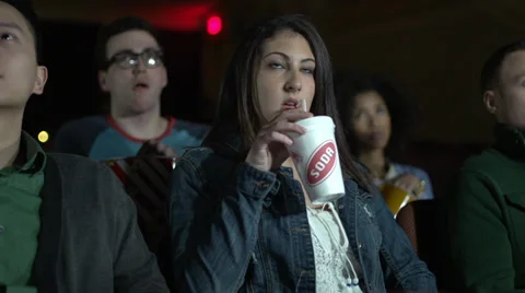 Enjoying a movie (2 of 4) Stock Footage 35166313