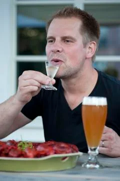 Enjoying a schnapps Stock Photos