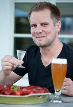 Enjoying schnapps Stock Photos