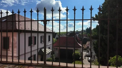 Enjoying a Sunny Day Overlooking Charming Town Rooftops in Early Afternoon Stock Footage 287901172
