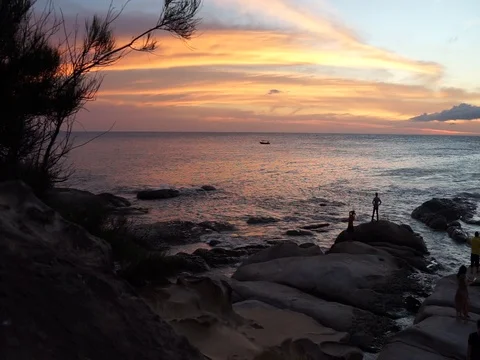 Enjoying sunset at the beach Stock Footage 107170528