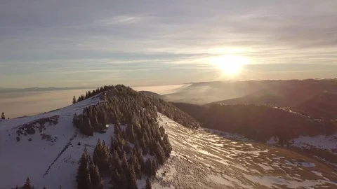 Enjoying sunset on the top of a mountain with melting snow in Switzerland Stockbeeldmateriaal 123710860