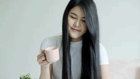 Enjoying time in bed with cup of coffee. Stock Footage 104070159