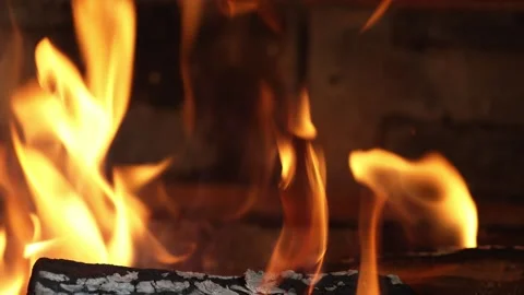 Enjoying the Warmth of a Cozy Fire on a Chilly Evening Stock Footage 311842957