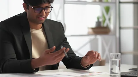 Enjoying work confident man checking documents Stock Footage 219748239