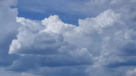An enlarged view of the clouds that begin to condense into the dark rain clou Stock Photos
