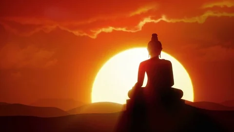 Enlightenment - Sun rises over silhouette of Buddha statue in desert Stock Footage
