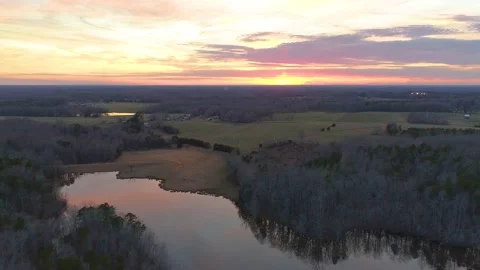 Eno river sunset Fly Out Reverse Dolly shot - 4K Drone Footage Stock Footage 234344481