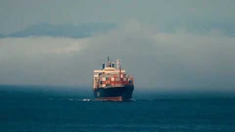 Enormous Cargo Ship stacked with containers turns toward San Francisco Bay Stock Footage 94877054