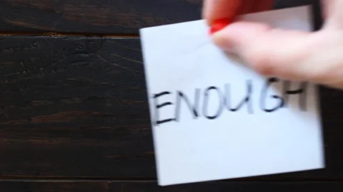 Enough word on the sticker Stock Footage 102767127