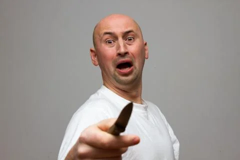 Enraged man with knife Stock Photos