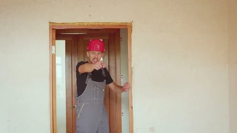 Enraged nervous worker or an engineer yelling and swearing at the camera. Stock Footage 94014980