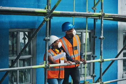 Ensuring the site satisfies the project standards and specifications. a young Stock Photos