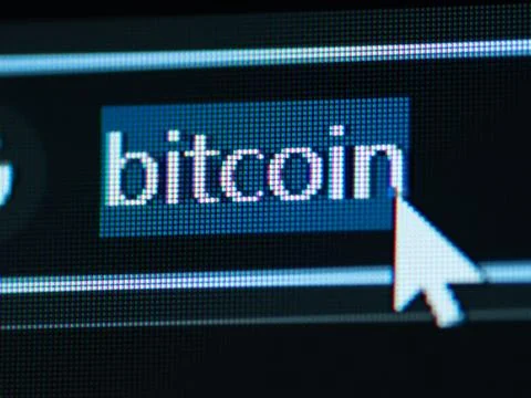 Enter Bitcoin-specific letters in the browser input box. Stock Photos