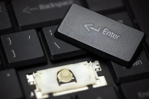 Enter button of laptop keyboard has crashed. Stock Photos