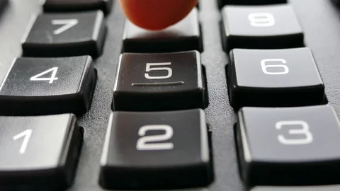 Enter the code with your finger on the buttons with numbers. Stock Footage 100129262
