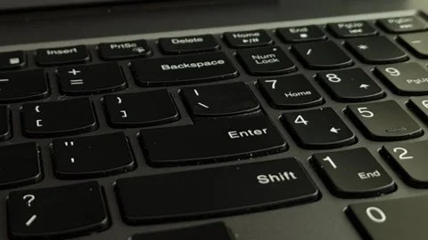 Enter key on computer keyboard above a shift key Stock Footage 242865434