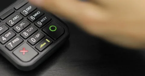 Enter pin code on terminal. Using Credit Card Terminal at shop Stock Footage 91932218