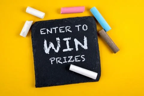 Enter to win prizes. Text on a stone surface. Banner for business Stock Photos