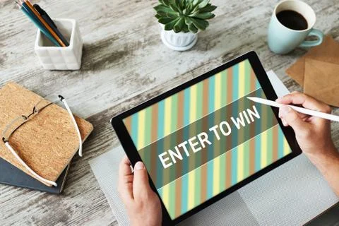Enter to win text on the screen. Giveaway. Lottery and prizes. Social media Фото