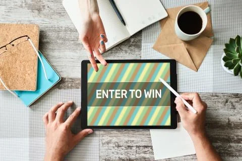 Enter to win text on the screen. Giveaway. Lottery and prizes. Social media 스톡 사진