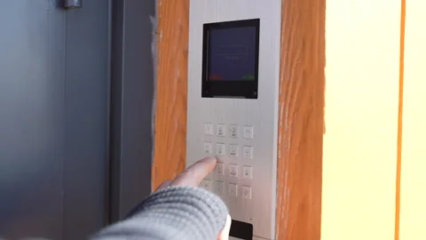 Entering Access Code on Intercom Panel Video stock 311265258
