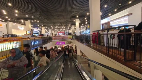 Entering AEON Retail in Paris Van Java Mall Video stock 332185565