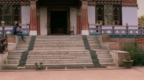 Entering a Buddhist temple by going smoothly up the stairs. Stock Footage 39786830