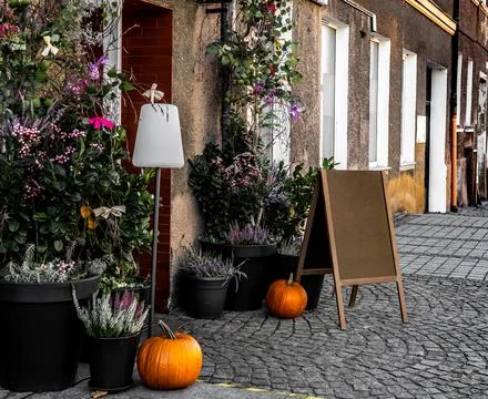 Entering Cafe With Fall Decorations And Pumpkins Stock Photos