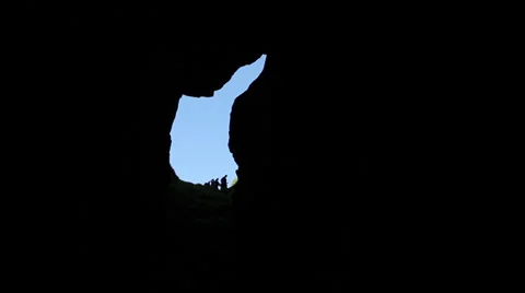 Entering cave silhouettes Stock Footage 39687204