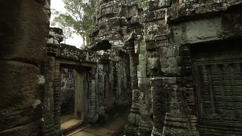 Entering deeply into temple complex, smooth forward tracking shot, Prasat Kravan Stock Footage 76381340