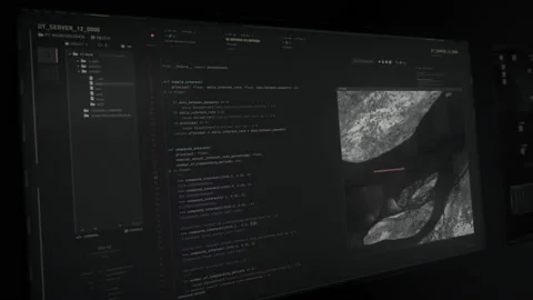 Entering the digital code into the futuristic software development program Stock Footage 198942320