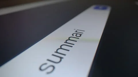 Entering a document summarising request into an AI chatbot on a tablet Stock Footage 346664311