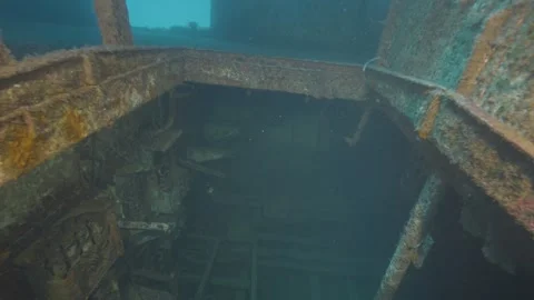 Entering the engine room of a wrecked ship on the seabed Stock Footage 311845791