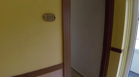 Entering a equipped double room Stock Footage 61544426