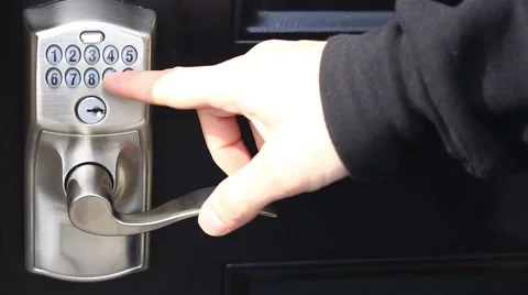 Entering numerical code for open the door Stock Footage 47558993
