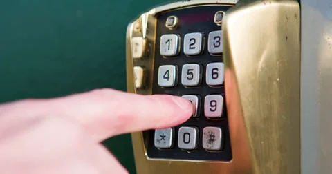 Entering numerical key code to door 4k Stock Footage 36424089