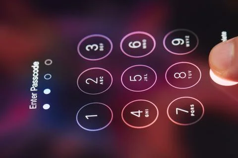 Entering passcode on smartphone Foto stock