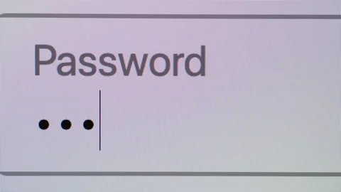 Entering password in a password box on a computer screen Stock Footage 148569414