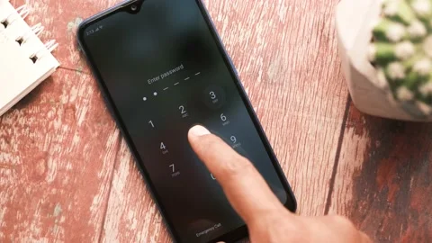 Entering password on smart phone , Stock Footage 162255668