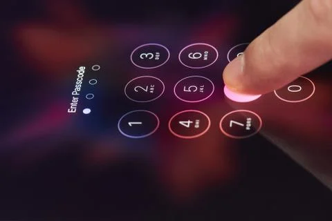 Entering password on smartphone Stockfoto's