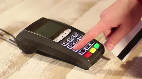 Entering pin code and making  contactless payment using pos terminal Stock Footage 65392511