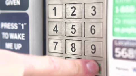 Entering pin code at keypad Stock Footage 30765863