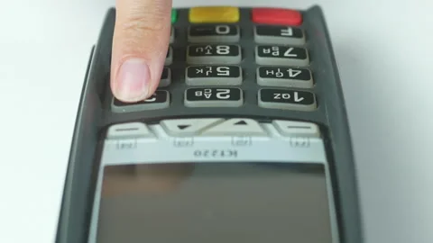 Entering a PIN code on the POS terminal Stock Footage 272793007