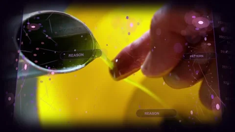 Entering red nail finger pulling green thread from spoon collecting droplet in Stock Footage 331701573